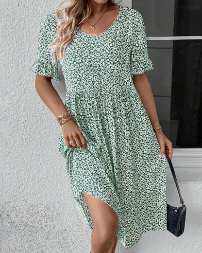 Élénaïs – Élégante robe midi à motifs floraux