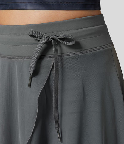Cassiopée – Élégante jupe midi fluide 2 en 1