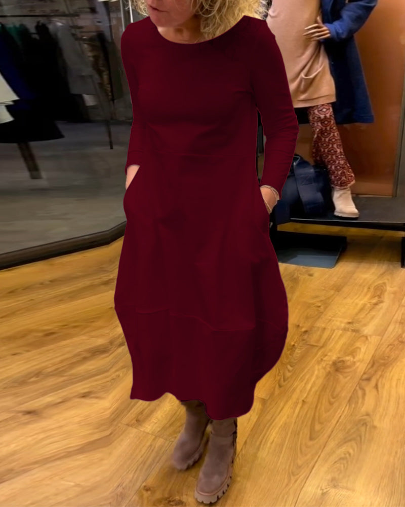 Andrée - Élégante robe midi avec poches