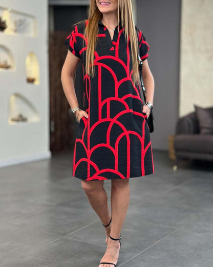 Nahia – Élégante robe midi à manches courtes avec rabat