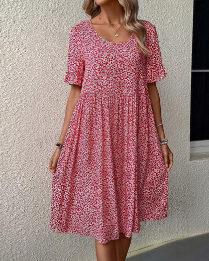 Élénaïs – Élégante robe midi à motifs floraux