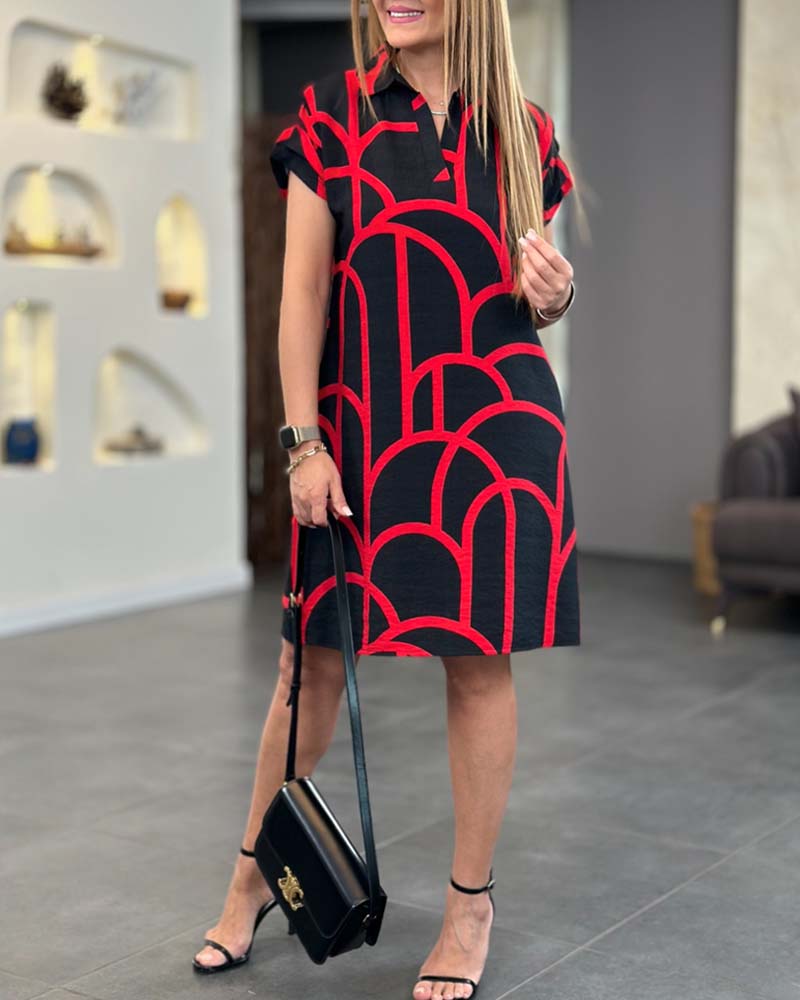 Nahia – Élégante robe midi à manches courtes avec rabat