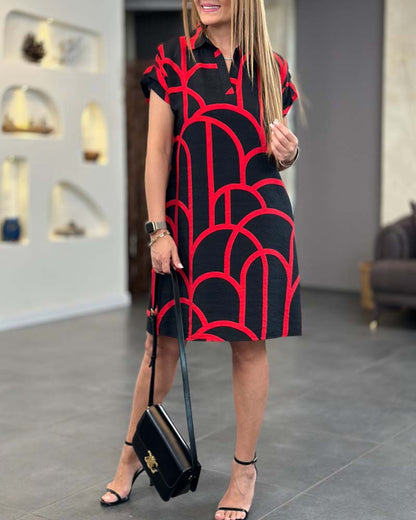 Nahia – Élégante robe midi à manches courtes avec rabat