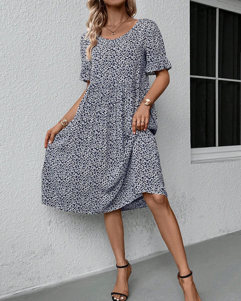 Élénaïs – Élégante robe midi à motifs floraux