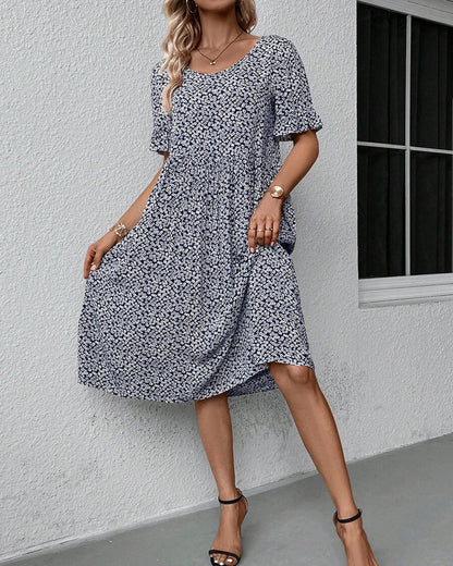 Élénaïs – Élégante robe midi à motifs floraux