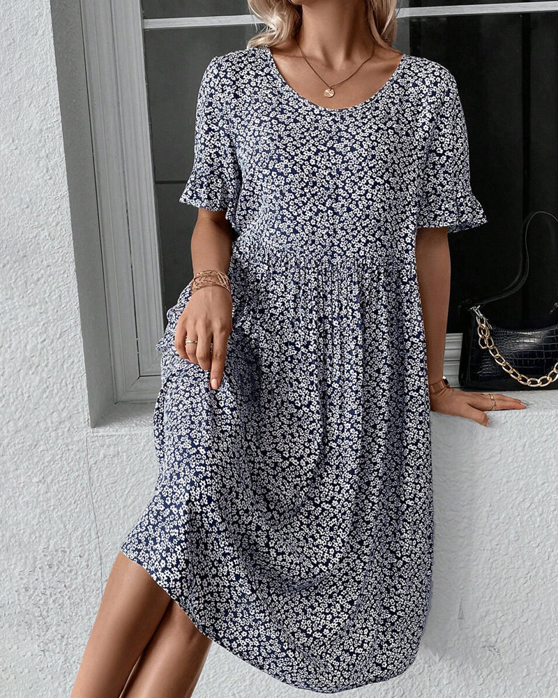 Élénaïs – Élégante robe midi à motifs floraux
