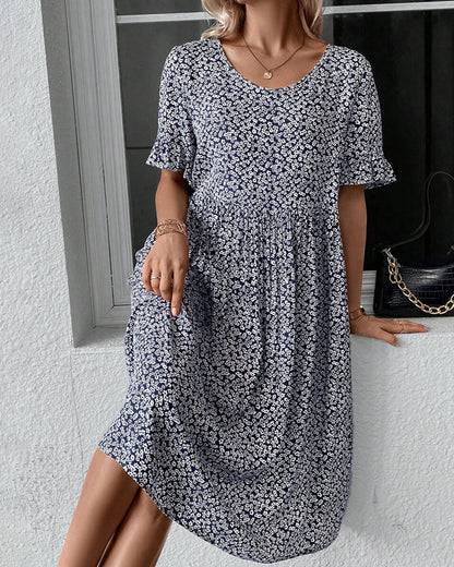 Élénaïs – Élégante robe midi à motifs floraux
